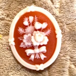 Raised floral cameo style brooch
